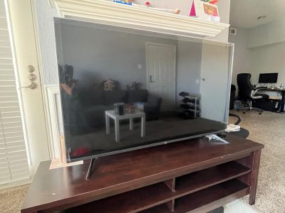 TV 55 inch brand used like new TV along with TV table for sale