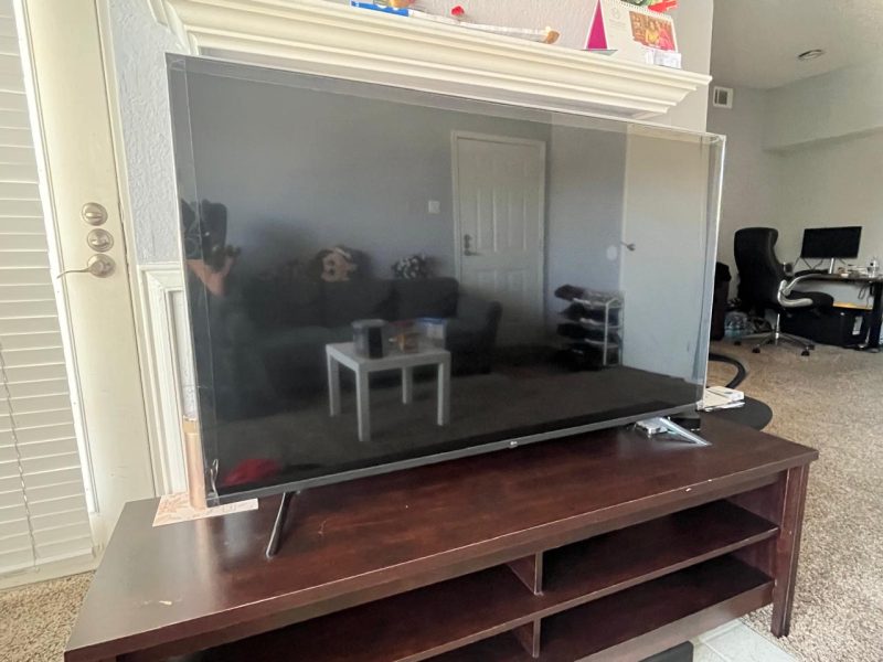 TV 55 inch brand used like new TV along with TV table for sale